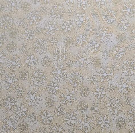 season's greetings snowflakes navy metallic fabric|EOB Seasons Greetings by Hoffman International Fabrics Tan.